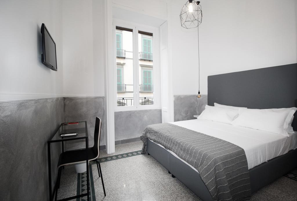 Toledostop Naples Extérieur photo A room at the hotel